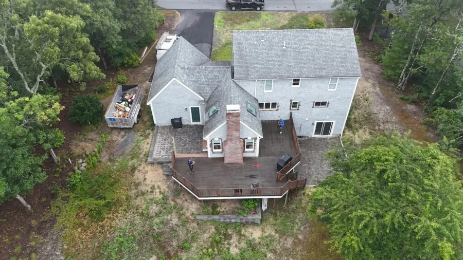 Aerial view of a home during exterior work