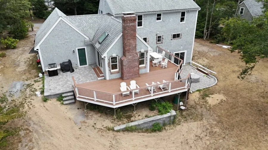 Aerial view of a house with a new deck