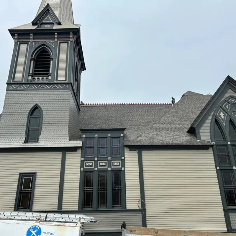 Church steeple with fresh siding and trim