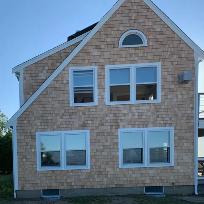 Cedar shingle home with new windows